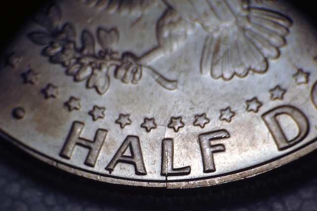 2020 Kennedy Half Dollar die crack error showing raised line defect across coin surface from die fracture