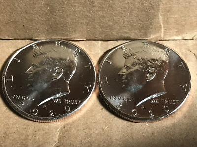 US Mint facility or group of 2020 Kennedy Half Dollar specimens in varying grades from worn to gem uncirculated